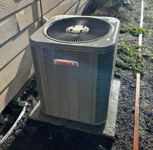 Air conditioning unit installed outside a home in Vancouver WA by SureTech Heating & Cooling